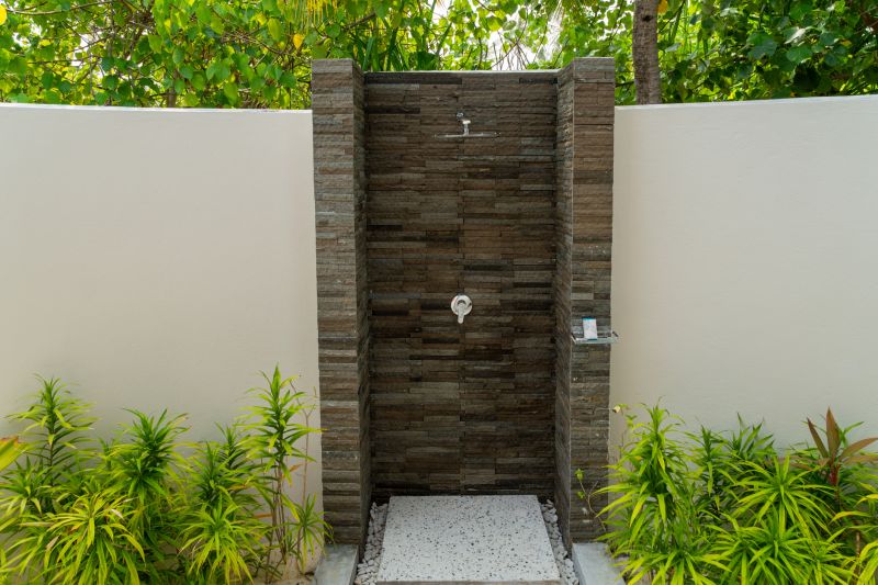 Shower with Natural Stone Wall